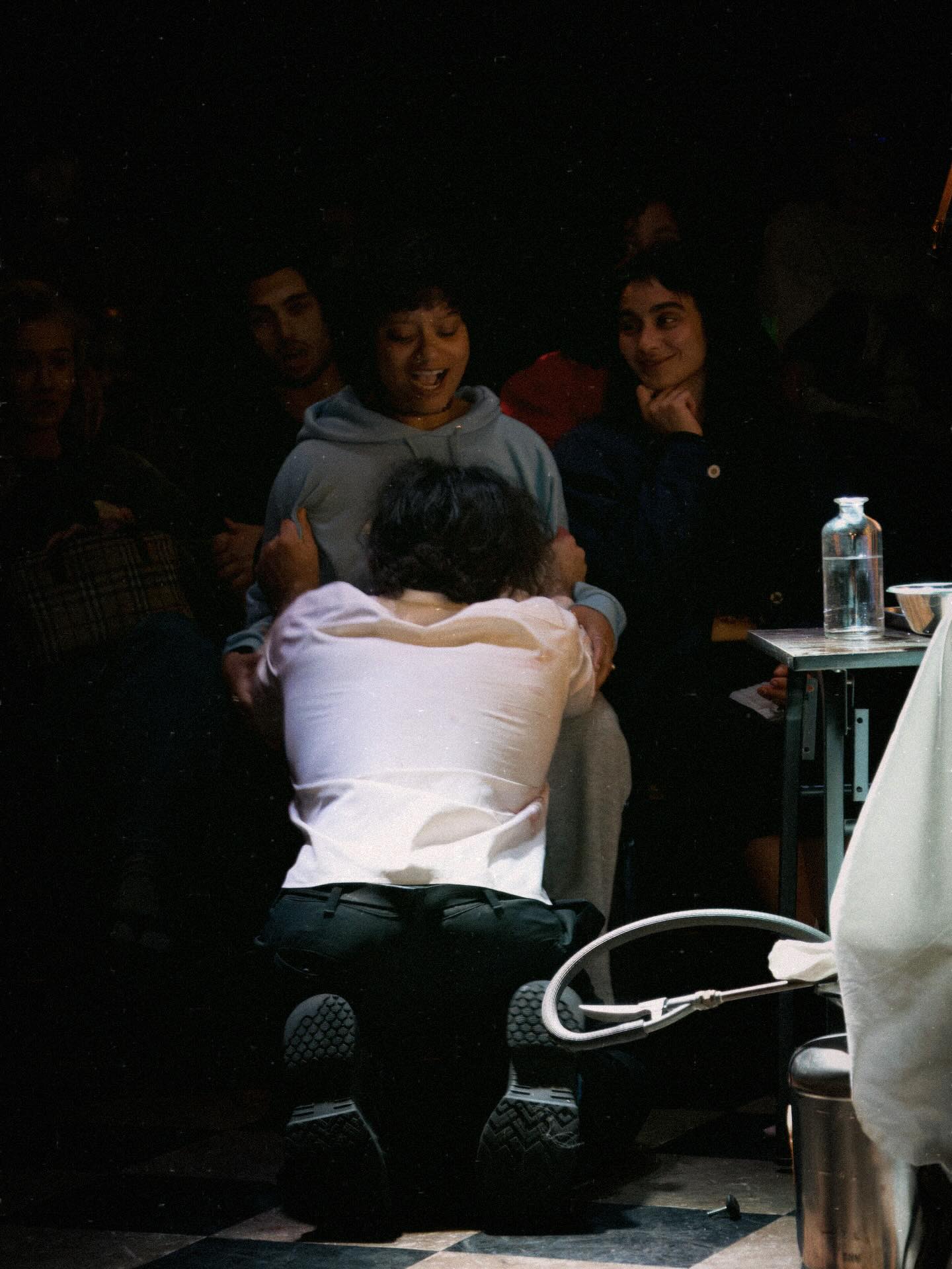 Dr. Darwin pleads with an audience member.